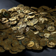 Imagen para el artículo titulado Encuentra 4.000 monedas romanas de hace 1.700 años tratando de acabar con un topo